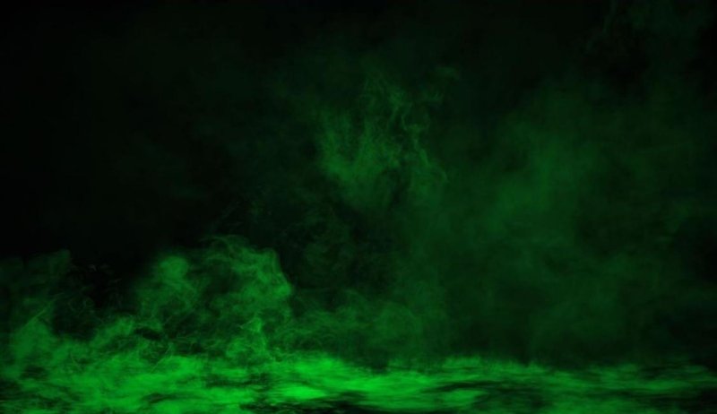 Зеленый туман на черном фоне
