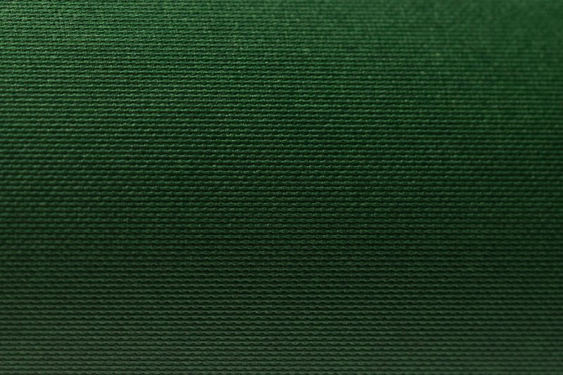 Темно зеленая ткань