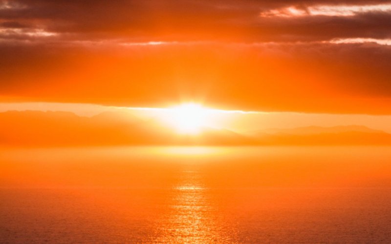 Блик солнца на закате