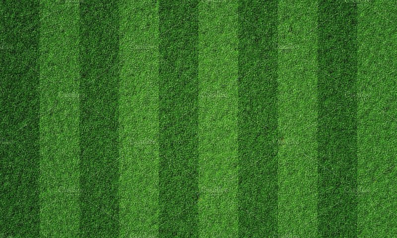 Зеленый футбольный газон