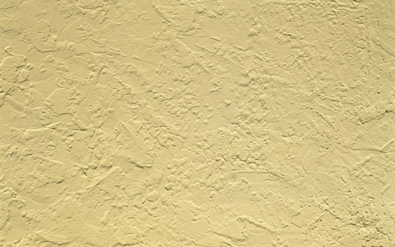 Желтая штукатурка