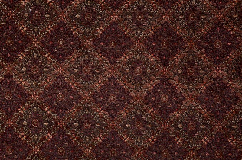 Коричневая ткань с узором