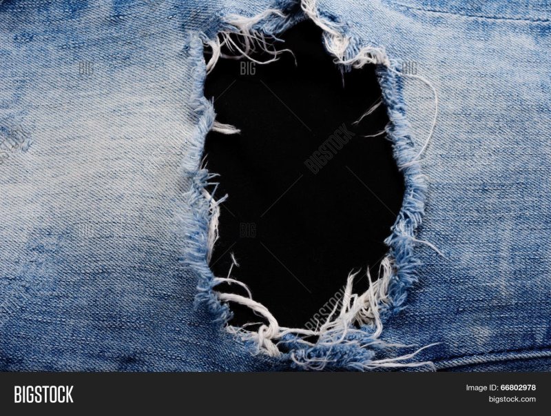 Рваная джинсовая ткань