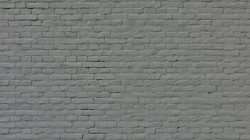 Серая кирпичная стена