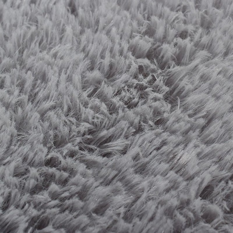 Серый пушистый ковер