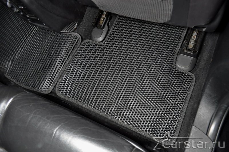 Коврики ЭВА КАМАЗ 54901, черные соты, черный кант