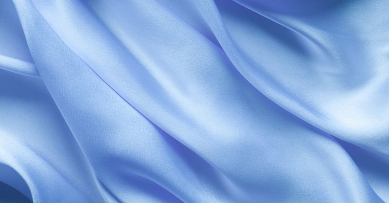Голубая ткань драпировка