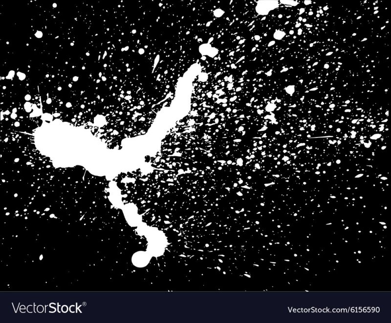 Капли белой краски на черном фоне
