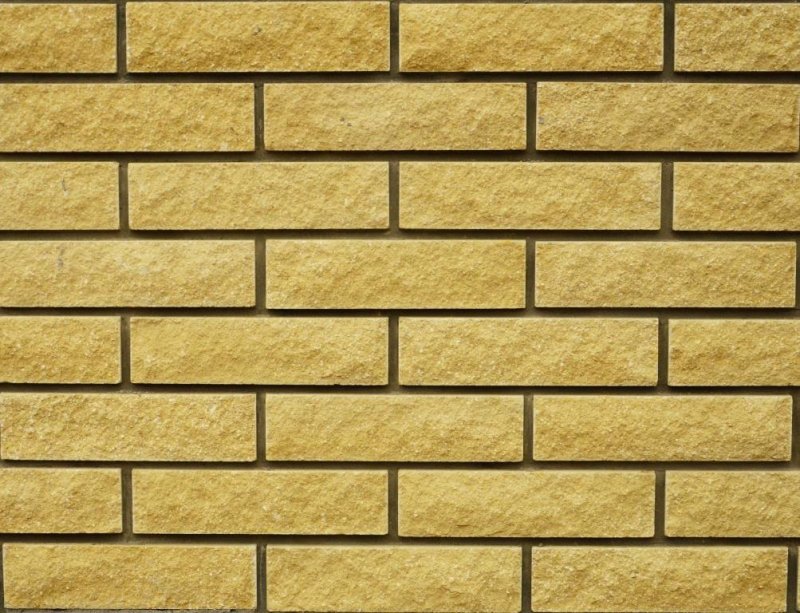 Кирпич облицовочный ЖКЗ слоновая кость скала 1нф текстура бесшовная